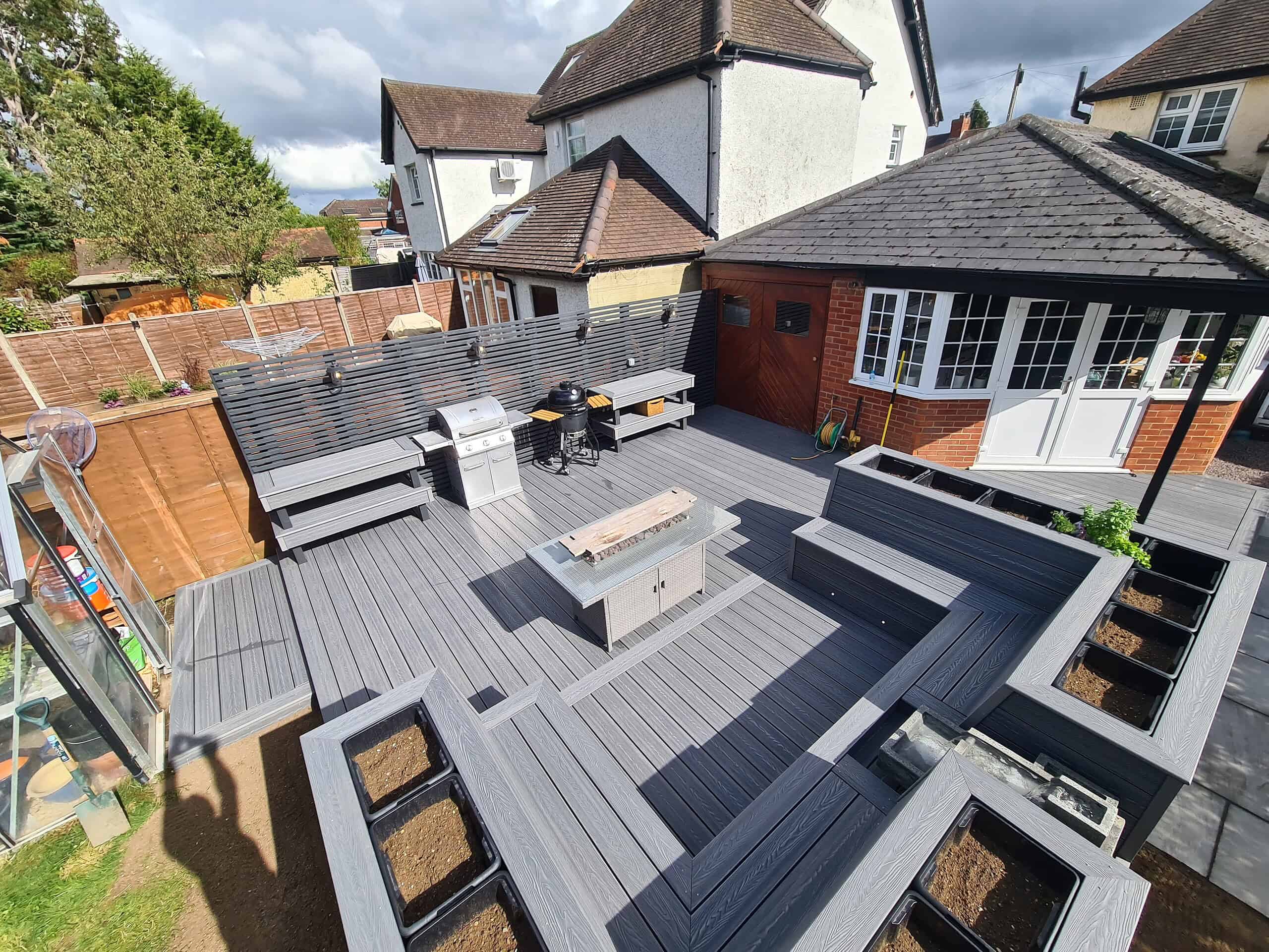 Modern grey composite decking for outdoor living spaces.
