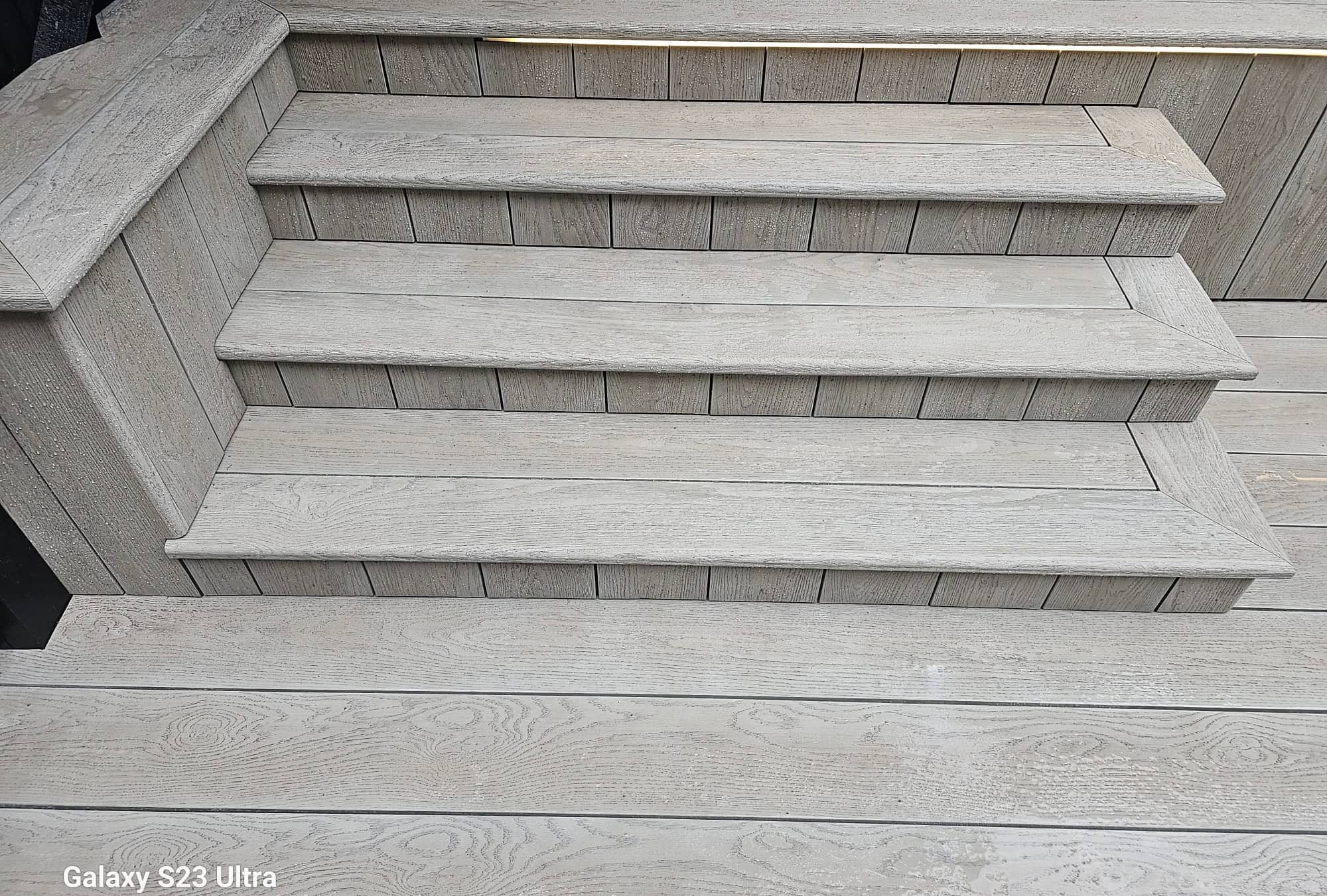 High-quality composite decking for outdoor spaces in Windsor, offering durability and aesthetic appe.