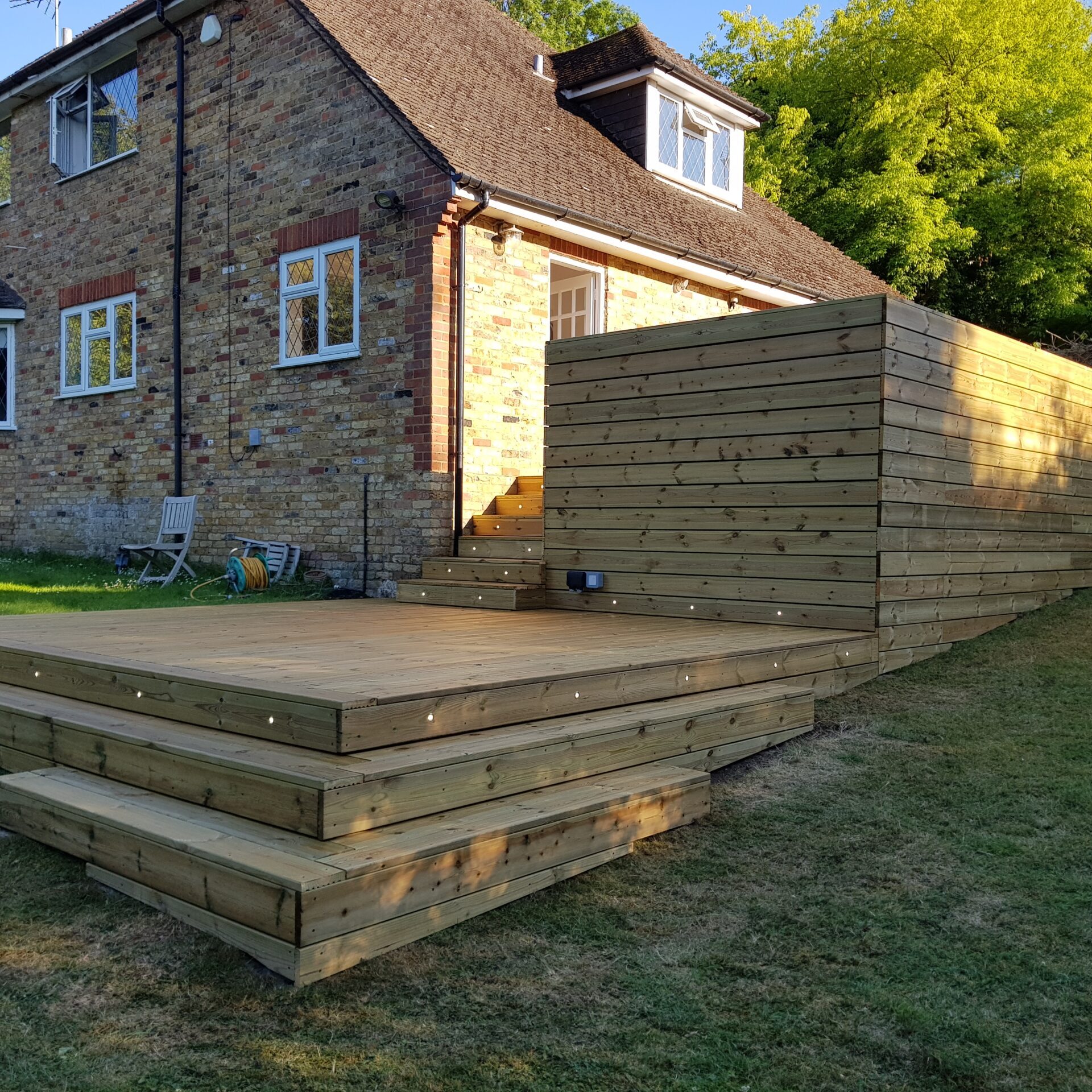 Decking in London with durable softwood for outdoor spaces.
