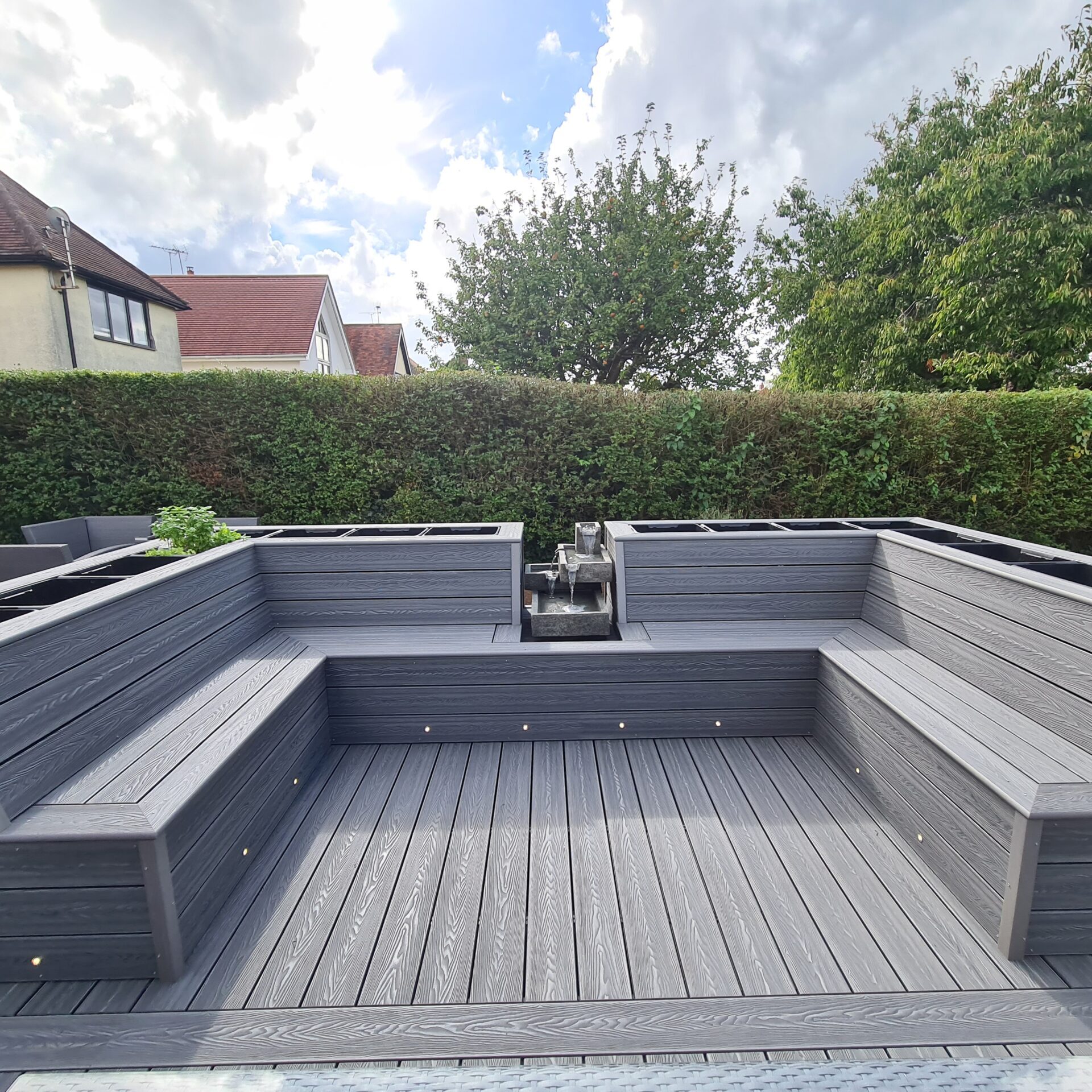 Modern grey composite decking for outdoor spaces in London.